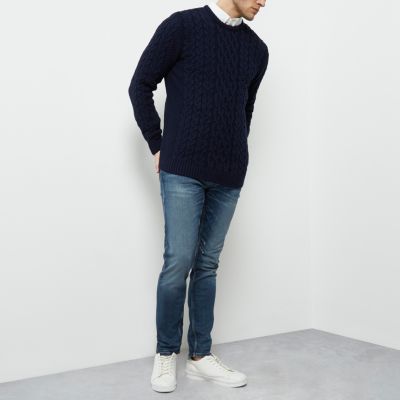 Navy blue cable knit crew neck jumper